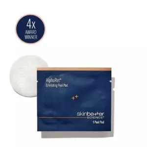 White background with a paper in the center featuring text that reads "skinbetter science alpha retinol exfoliating peel pad"