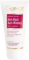 White background with a tube of Guinot Anti-Rides Anti-Wrinkle Rich Cream