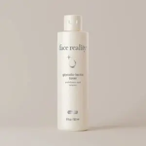 White bottle of face reality glycolic-lactic toner with a cap, set against a white background