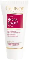 White background with a tube of Guinot Hydra Beauté Cream, a moisturizing cream, in the center