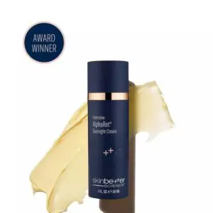 Bottle of ® Overnight Cream, with a cream-like substance on the surface and the words "" written on it